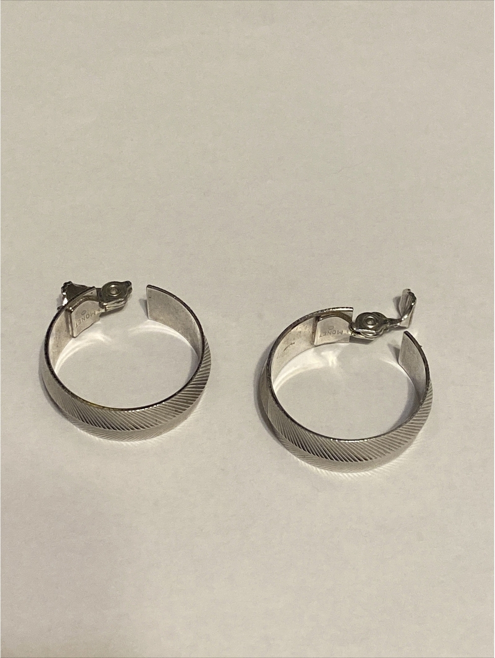 monet silver tone clip on earrings